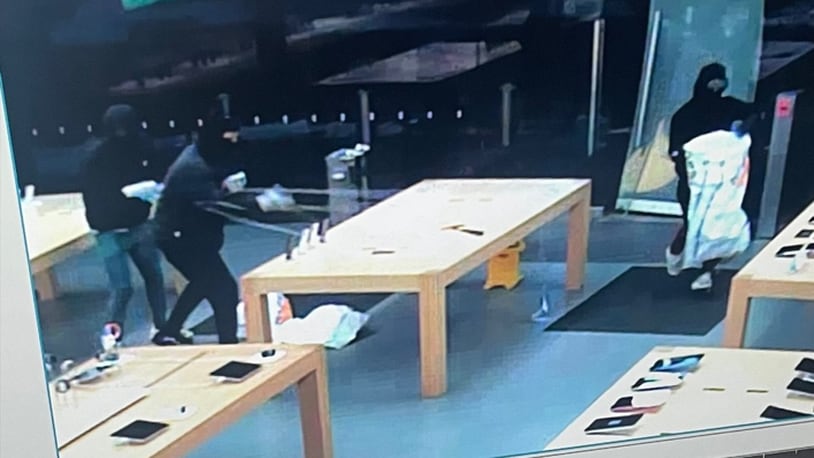 Beavercreek police are investigating the theft of more than $100,000 worth of Apple products stolen early Monday, Jan. 23, 2023, after three people broke into the Apple store the Apple store at The Greene and filled bags with items before leaving in dark-colored sedan, possibly a maroon Ford Fusion, police said. CONTRIBUTED