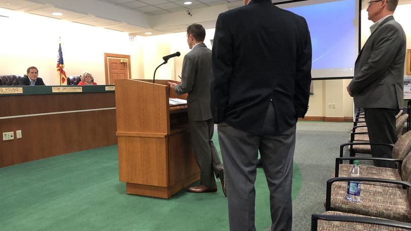 Executives from Century Link and Cincinnati Bell answer questions Tuesday from Warren County commissioners about why the 911 system malfunctioned. STAFF/LAWRENCE BUDD