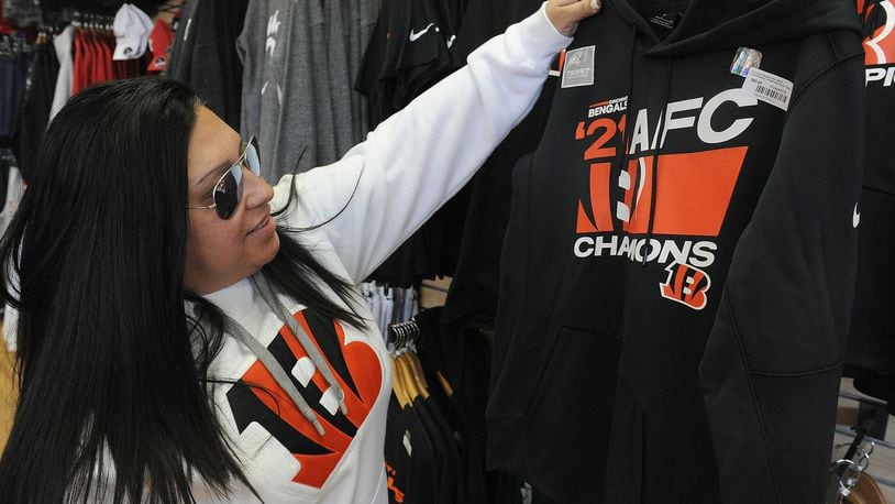Lisa Zimmerman, checks out Bengals merchandise Wednesday Feb. 9, 2022 at the Rally House located at 2782 Miamisburg Centerville Road. Bengals fans have been flocking to the store looking for Bengals gear. MARSHALL GORBY\STAFF