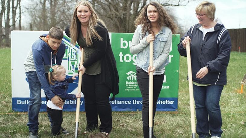 Karen Mullen and her three children – Jaden, Delaney and Sailor, will live in a home being built by Airstream and Habitat for Humanity