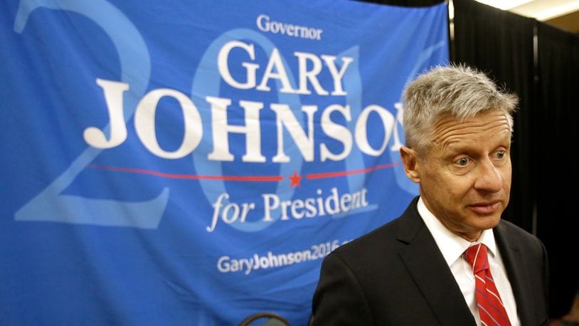 In this May 27, 2016, file photo, Libertarian presidential candidate Gary Johnson speaks to supporters and delegates at the National Libertarian Party Convention in Orlando, Fla. Libertarian Party activists in Ohio, hoping to get party nominee Gary Johnson on Ohio’s ballot, said they submitted petition signatures Tuesday, Aug. 9, 2016, for Charlie Earl, a 2014 candidate for governor, as a placeholder because they began collecting signatures before Johnson’s nomination. (AP Photo/John Raoux, File)