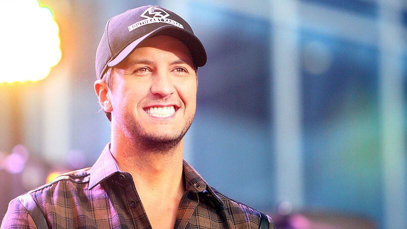 NASHVILLE, TN - NOVEMBER 06:  Luke Bryan performs on ABC's "Good Morning America" outside of the Bridgestone Arena ahead of the CMA Awards on November 6, 2013 in Nashville, Tennessee.  (Photo by Marianna Massey/Getty Images)