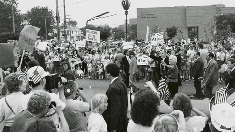 George and Barbara bush wave at their supporters in West Carrollton in August, 1988.