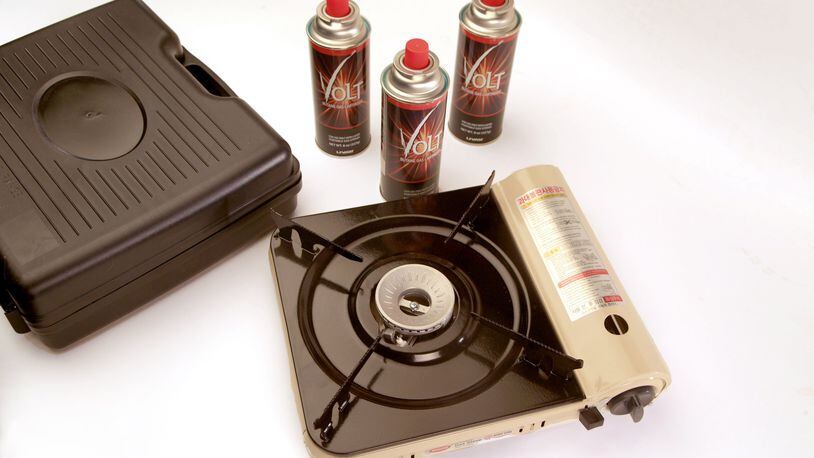 A Hanaro portable gas stove, with carrying case and butane canisters. (Kirk McKoy/Los Angeles Times/TNS)