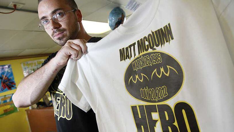 David Kasel, the owner of Signstein Graphics in Huber Heights, has designed a t-shirt in memory of his former school mate Matt McQuinn who died in the movie theatre shooting in Aurora, Co. Proceeds from the sale of the shirts will go to McQuinn's family to help cover funeral expenses.
