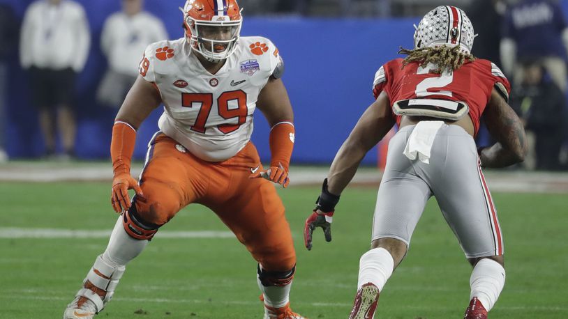 FILE - In this Dec. 28, 2019, file photo, Clemson offensive tackle Jackson Carman (79) looks to block during the first half of the Fiesta Bowl NCAA college football game against Ohio State in Glendale, Ariz. The Cincinnati Bengals got some help for their offensive line Friday night, taking Carman with their second-round pick in the NFL draft. (AP Photo/Rick Scuteri, File)