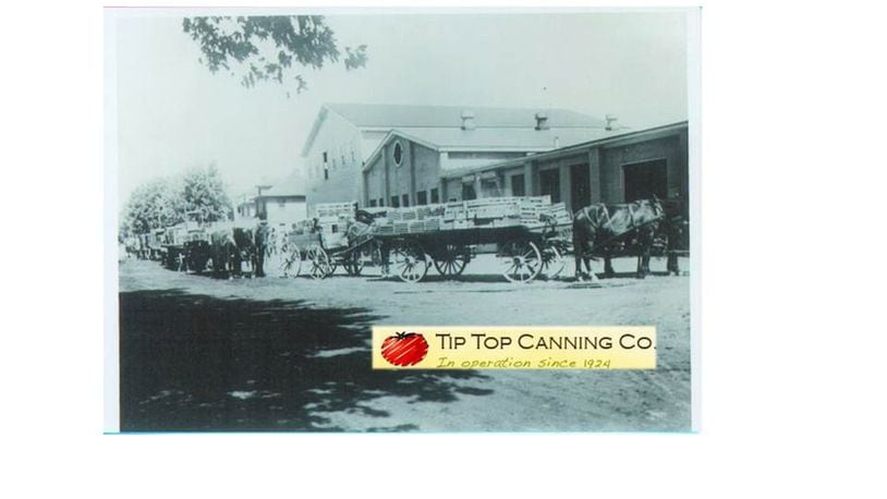 Horses deliver tomatoes to the cannery in Tipp City in this old photo of the Tip Top Canning Company, which will close this year. CONTRIBUTED