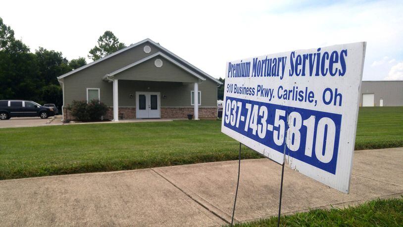 Premium Mortuary Services, a Carlisle-based crematory, had its license revoked earlier this month by the Ohio Board of Embalmers and Funeral Directors after it was cited for 15 violations. The business has now had its license temporarily reinstated. NICK GRAHAM/STAFF