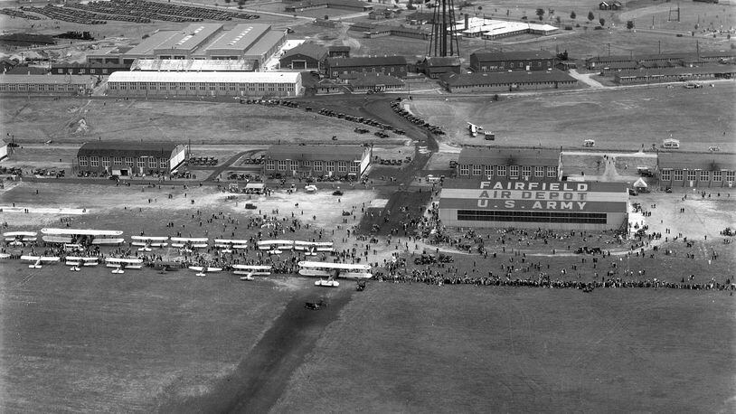 Aerial view of the Air Corps Carnival at Fairfield Air Depot, 1930. Thousands of spectators attended the airshow and carnival on the Fairfield Air Depot Reservation flightline. In the foreground a “modern” steel hangar (now Building 145 in Area A, Wright-Patterson Air Force Base) carries the inscription “Fairfield Air Depot U.S. Army.” FAD Headquarters (Building 1) can be seen at the top center.