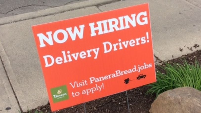 This sign greets customers at the Panera Bread cafe on Brown Street near the University of Dayton, which is scheduled to begin small-order deliveries by June 6. MARK FISHER/STAFF