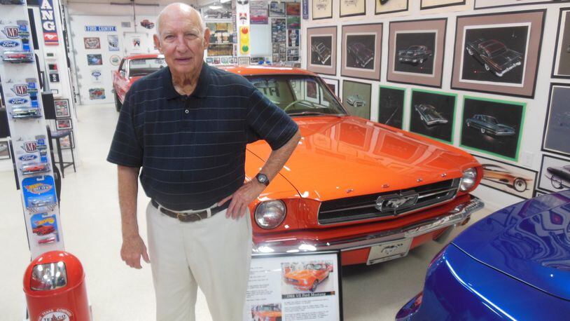 Gale Halderman, original designer of the Ford Mustang, stands in his personal museum in Tipp City, where much of his Ford Motor Co. memorabilia is displayed. Photo by Jimmy Dinsmore