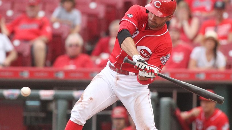 Reds first baseman Joey Votto hits against the Marlins on Thursday, Aug. 18, 2016, at Great American Ball Park in Cincinnati. David Jablonski/Staff