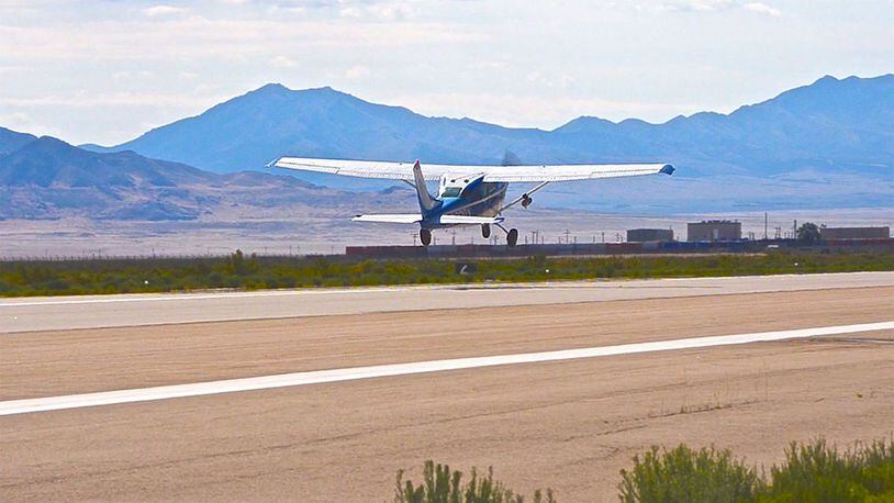 A ROBOpilot controlled 1968 Cessna 206 takes off during its first flight at Dugway Proving Ground, Utah. (Courtesy photo)