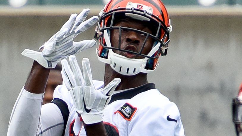 Wide receiver A.J. Green makes a catch during Bengals minicamp Wednesday, June 17 at Paul Brown Stadium in Cincinnati. NICK GRAHAM/STAFF