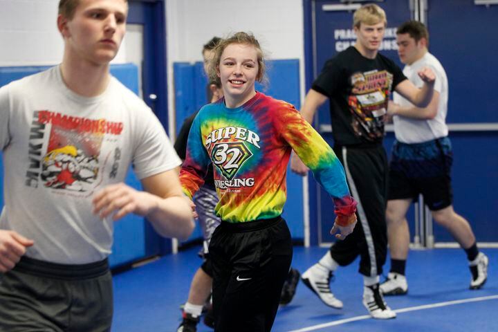 Young woman wrestles on high school team