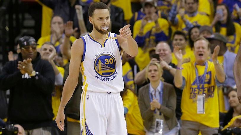 Golden State Warriors guard Stephen Curry (30) celebrates during the second half of Game 1 of a first-round NBA basketball playoff series against the Portland Trail Blazers in Oakland, Calif., Sunday, April 16, 2017. The Warriors won 121-109. (AP Photo/Jeff Chiu)