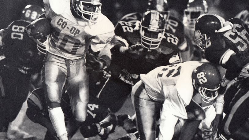 Patterson CO-OP on the run during a 1987 football game. DAYTON DAILY NEWS ARCHIVE