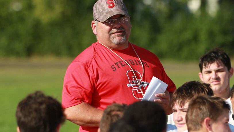 Stebbins head coach Greg Bonifay talks to his team during the 2019 season. Bonifay will coach the North squad in Friday's Miami Valley Football Coaches Association All-Star Game. FILE PHOTO