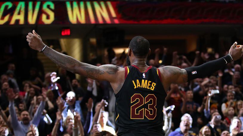 CLEVELAND, OH - MAY 05: LeBron James #23 of the Cleveland Cavaliers celebrates after hitting the game winning shot to beat the Toronto Raptors 105-103 in Game Three of the Eastern Conference Semifinals during the 2018 NBA Playoffs at Quicken Loans Arena on May 5, 2018 in Cleveland, Ohio. NOTE TO USER: User expressly acknowledges and agrees that, by downloading and or using this photograph, User is consenting to the terms and conditions of the Getty Images License Agreement. (Photo by Gregory Shamus/Getty Images) *** BESTPIX ***