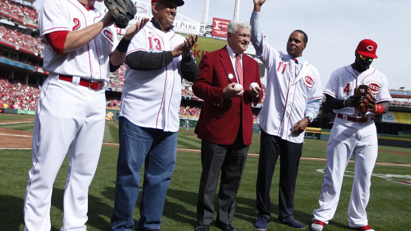 Reds shortstop Zack Cozart, former Red Dave Concepcion, owner Bob Castellini, former Red Barry Larkin and second baseman Brandon Phillips are introduced before a game against the Cardinals on Opening Day at Great American Ball Park on Monday, March 31, 2014, in Cincinnati. David Jablonski/Staff