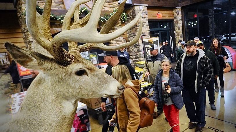Black Friday shoppers looking for good deals. Pour into the Cabela’s in Centerville as soon as the doors open at 5 o’clock Friday morning November 25, 2022. MARSHALL GORBY \STAFF