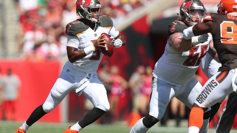 Tampa Bay Buccaneers quarterback Jameis Winston (3) scrambles in the pocket to find an open receiver during the first quarter against the Cleveland Browns on Sunday, Oct. 21, 2018 at Raymond James Stadium in Tampa, Fla. (Monica Herndon/Tampa Bay Times/TNS)