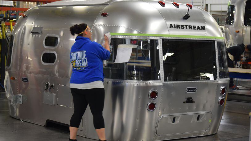 Airstream's Jackson Center operation will grow in late December when travel trailer manufacturing moves into a new 750,000 square-foot, $50 million facility.  Production in the new Shelby County facility will begin at the start of the new year. About 960 people work at the Airstream operation in Jackson Center. Workers who manufacture motor homes across the street will move into the former travel trailer manufacturing plant and service will move into the former motor home facility. STAFF PHOTOS / HOLLY SHIVELY