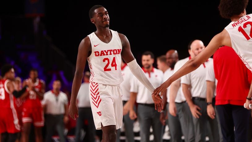 Dayton's Kobe Elvis leaves the court after a loss against Wisconsin on Wednesday, Nov. 23, 2022, in the first round of the Battle 4 Atlantis at Imperial Arena at the Paradise Island Resort in Nassau, Bahamas. David Jablonski/Staff