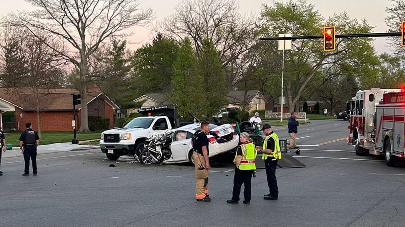Police, fire and other Kettering city crews monitor the closed intersection of Wilmington Pike and David Road around 8 p.m. Monday, April 15, 2024, after a serious crash sent four people to hospitals. JEREMY P. KELLEY / STAFF