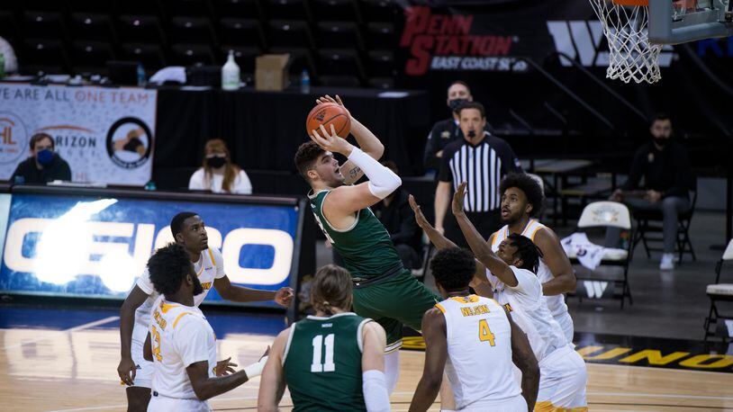 Wright State's Grant Basile puts up a shot during Friday's game at NKU. After losing Friday night, the Raiders bounced back to beat the Norse on Saturday to clinch a share of the Horizon League title. Joseph Craven/Wright State Athletics
