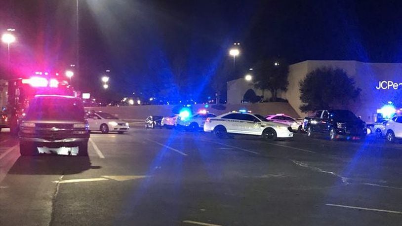 Authorities investigate after a woman was shot and killed outside Woodland Hills Mall in Tulsa Oklahoma, on Thursday, Feb. 1, 2018.