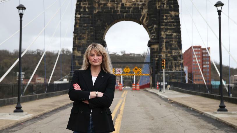 Transgender Mayoral candidate Rosemary Ketchum stands on a closed down bridge in Wheeling Island on Friday, April 5, 2024, in Wheeling, W.Va. (AP Photo/Kathleen Batten)