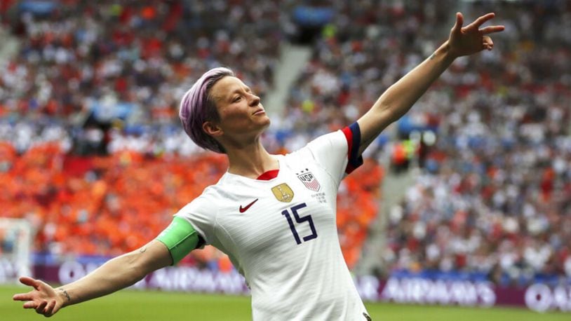 United States' Megan Rapinoe celebrates after scoring the opening goal from the penalty spot during the Women's World Cup final soccer match. (AP Photo/Francisco Seco)