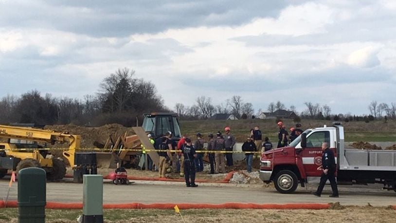 Emergency crews responded April 6 to a home under construction at the Landings at Sugarcreek. A man working alone at the site died when the walls of a trench collapsed on top of him. MONICA CASTRO/STAFF
