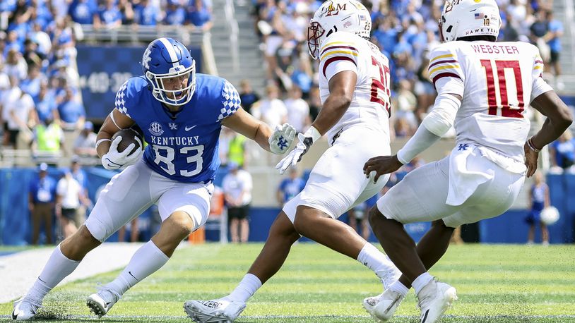 Kentucky tight end Justin Rigg (83) tries to run the ball past Louisiana-Monroe defenders during the second half of an NCAA college football game in Lexington, Ky., Saturday, Sept. 4, 2021. (AP Photo/Michael Clubb)