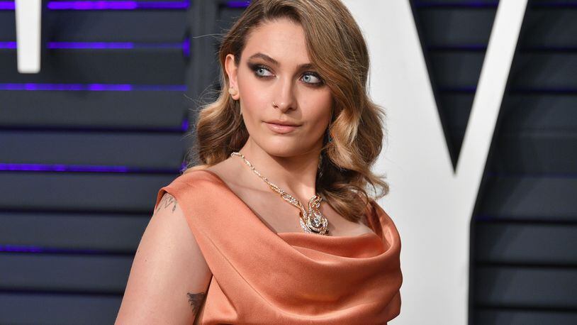 Paris Jackson, daughter of Michael Jackson, responded via Twitter to criticism of her public silence regarding molestation allegations against her father, saying it’s “not her role” to defend him.