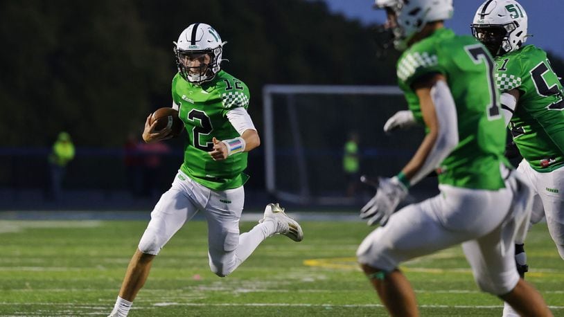 Badin quarterback Alex Ritzie carries the ball during their game against Fenwick Friday, Sept. 22, 2023 at Edgewood's Kumler Field. . NICK GRAHAM/STAFF