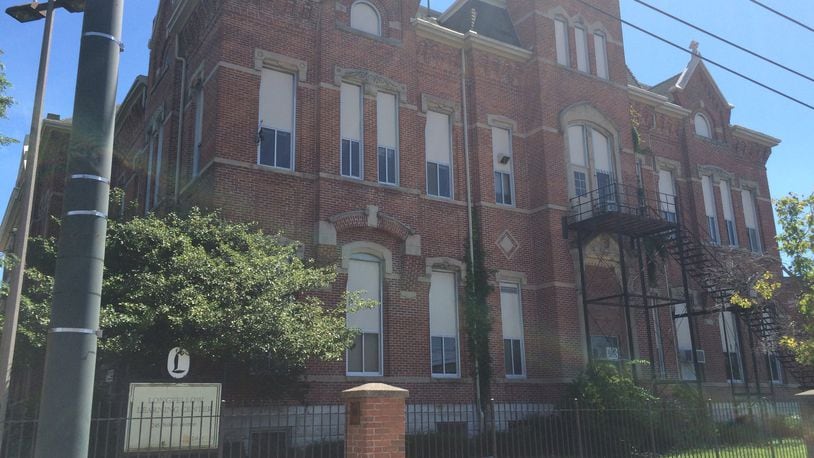 Dayton’s 137-year-old Longfellow Academy, at 245 Salem Ave., will be closed in 2017-18. JEREMY P. KELLEY / STAFF