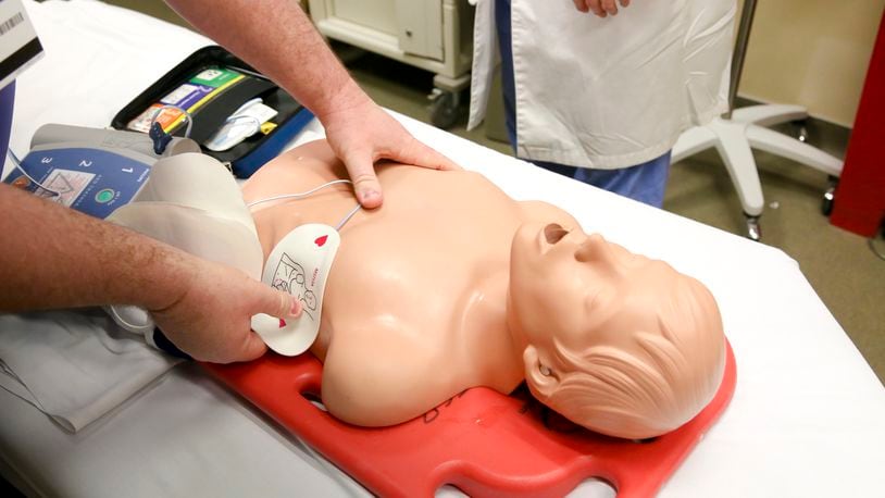 An AED (Automated External Defibrillator) is demonstrated at West Chester Hospital, Wednesday, Feb. 11, 2015. West Chester Hospital’s Emergency Department is now training EMS staff on “High Performance CPR”, and hopes to create a CPR clinic in the future. GREG LYNCH / STAFF