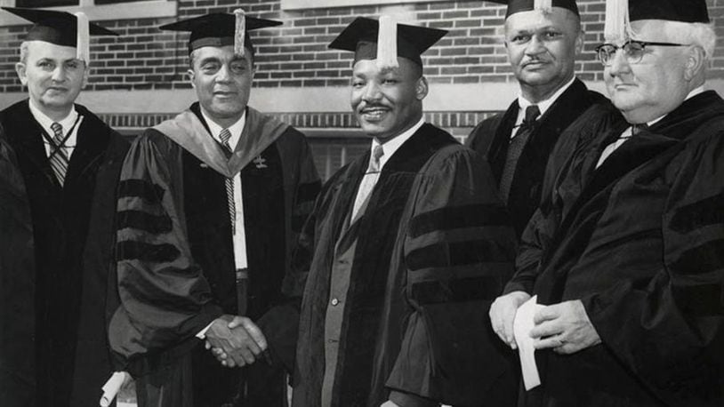 Dr. Martin Luther King, Jr. (center) received an honorary degree from Central State University in 1958. DAYTON DAILY NEWS ARCHIVES