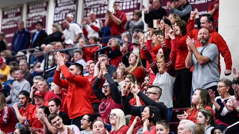 Franklin fans cheer on their team during the Wildcats’ Division II sectional-final victory over Monroe on Feb. 26 at Lebanon. NICK GRAHAM/STAFF