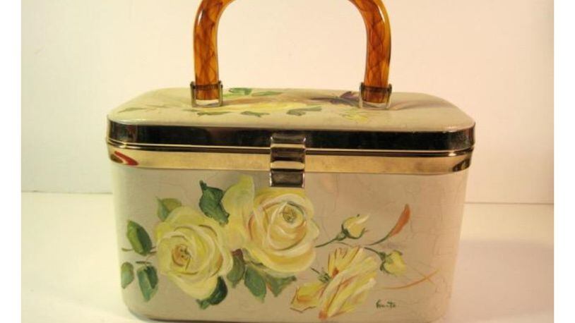 Roses seem to bloom on this vintage Lily-Bet bag. (Handout/TNS)