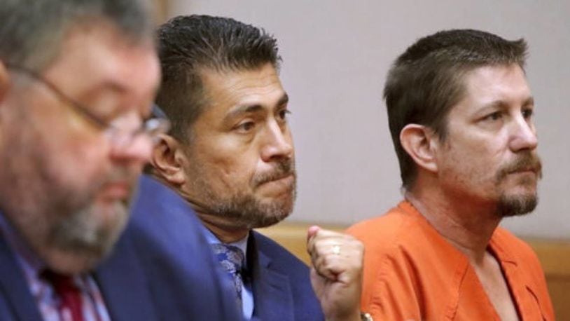 Michael Drejka, right, was convicted of manslaughter Friday night in the shooting of a man in the parking lot of a Florida convenience store last year.