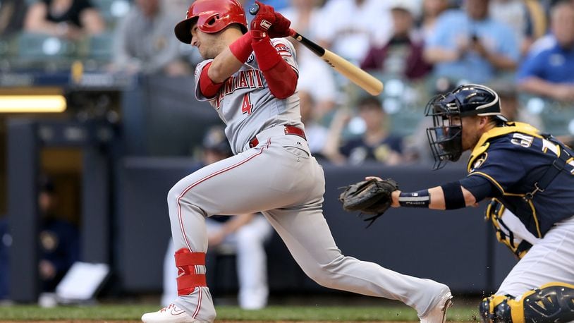 MILWAUKEE, WISCONSIN - JUNE 20:  Jose Iglesias #4 of the Cincinnati Reds hits a single in the first inning against the Milwaukee Brewers at Miller Park on June 20, 2019 in Milwaukee, Wisconsin. (Photo by Dylan Buell/Getty Images)