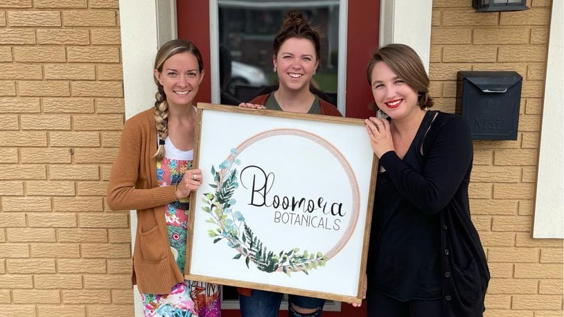 From left, Sara Zimmerman, Krissy Gordin, and Emily Prince, have opened a new shop, Bloomora Botanicals in Tipp City. CONTRIBUTED