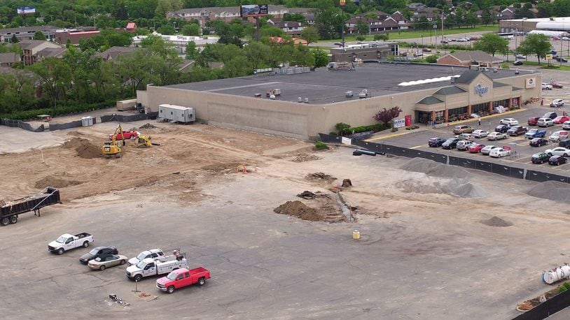 Preparation for construction of a new Kroger is underway in Moraine next to the existing grocery story. Demolition of the old Alex Bell Plaza opened up space for the new store. TY GREENLEES / STAFF