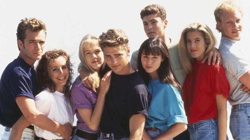 The original cast of “Beverly Hills, 90210,” pictured from left to right: Luke Perry, Gabrielle Carteris, Jennie Garth, Jason Priestley, Shannen Doherty, Brian Austin Green, Tori Spelling and Ian Ziering.