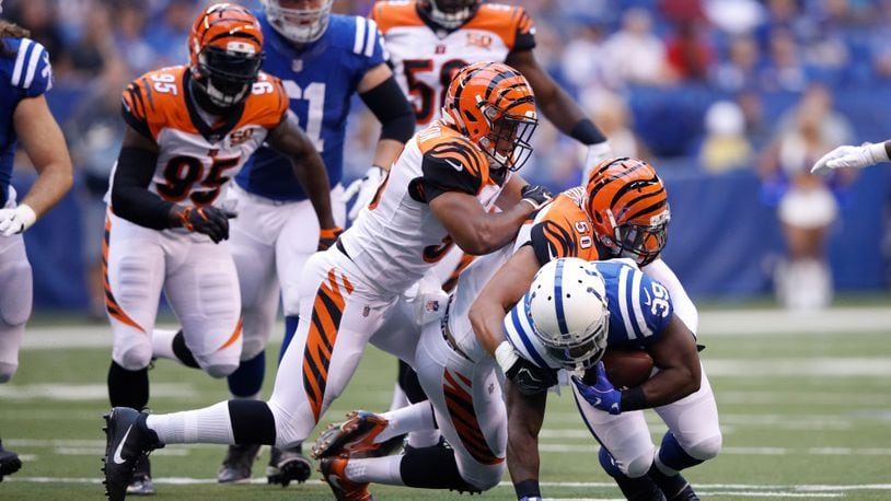 INDIANAPOLIS, IN - AUGUST 31: Jordan Evans #50 and Hardy Nickerson #56 of the Cincinnati Bengals tackle Troymaine Pope #39 of the Indianapolis Colts in the first half of a preseason game at Lucas Oil Stadium on August 31, 2017 in Indianapolis, Indiana. (Photo by Joe Robbins/Getty Images)