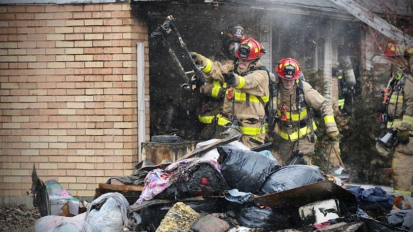 Several dogs perished in a fire Monday, Jan. 30, 2023, that damaged a large portion of a house ion Tilbury Road in Huber Heights. MARSHALL GORBY/STAFF