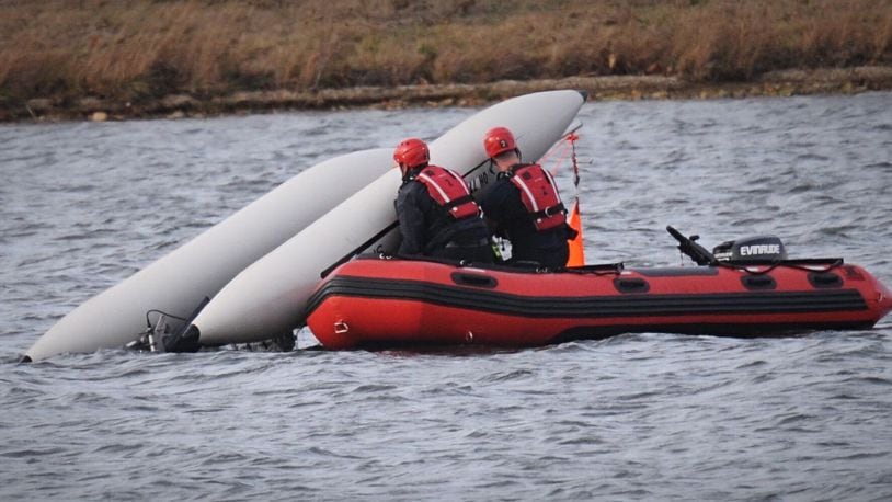 A man and his dog were rescued from Eastwood Lake after their catamaran capsized Nov. 19, 2020. MARSHALL GORBY\STAFF
